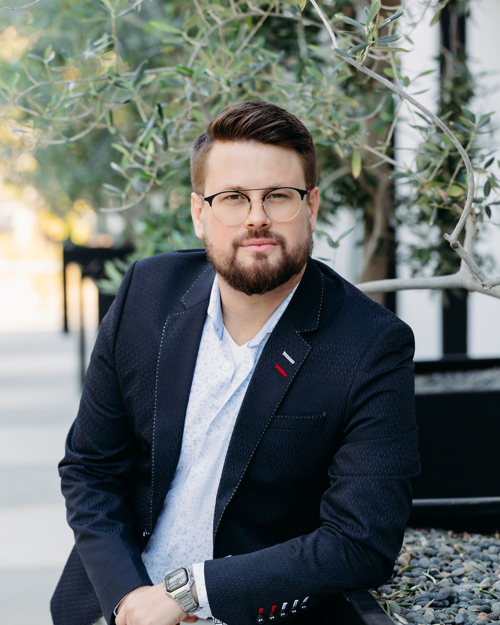 Portrait of Colin Rickard in a navy blazer